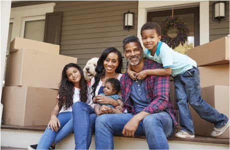 A joyful family of five and a dog .